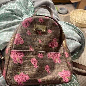 Juicy couture small backpack purse. Brown with pink roses
